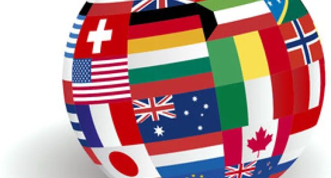 International flags superimposed over globe