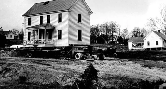 House Loaded Onto Two Trailers Ready To be Moved | History Of SC Slide Collection